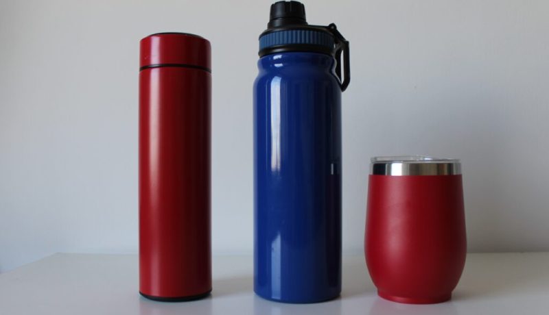 Composition with colorful reusable and stainless thermal bottles