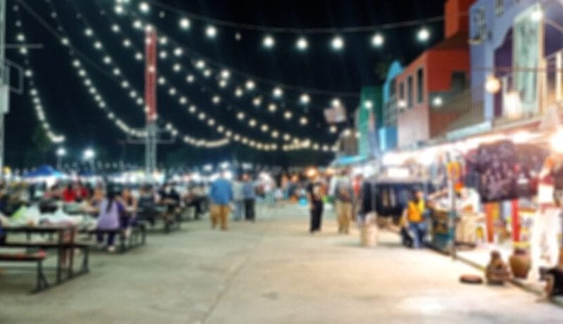 Blurred image of street food market with bokeh for background