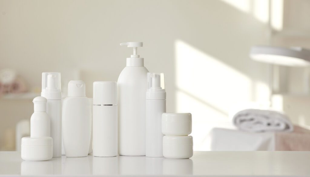 Wide selection set of natural organic cosmetics for skin care is on table in beauticians office