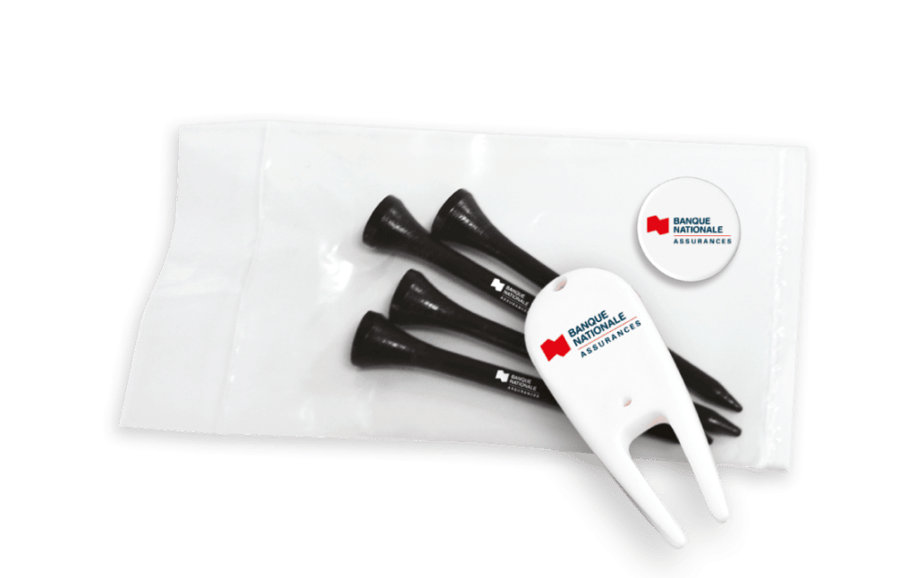 Promotional display for Banque Nationale Assurances: four black tees with a white fork-shaped promo tool on a white pouch with logos.