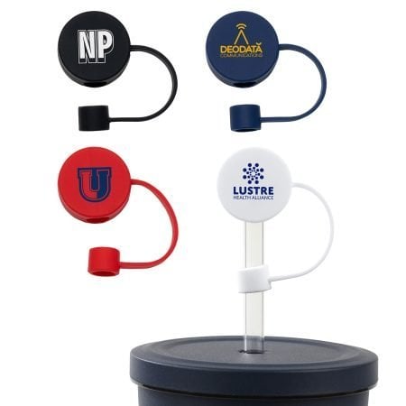 Set of four circular logo badge clips in black, blue, red, and white mounted on a stand beside a cup or tumbler.