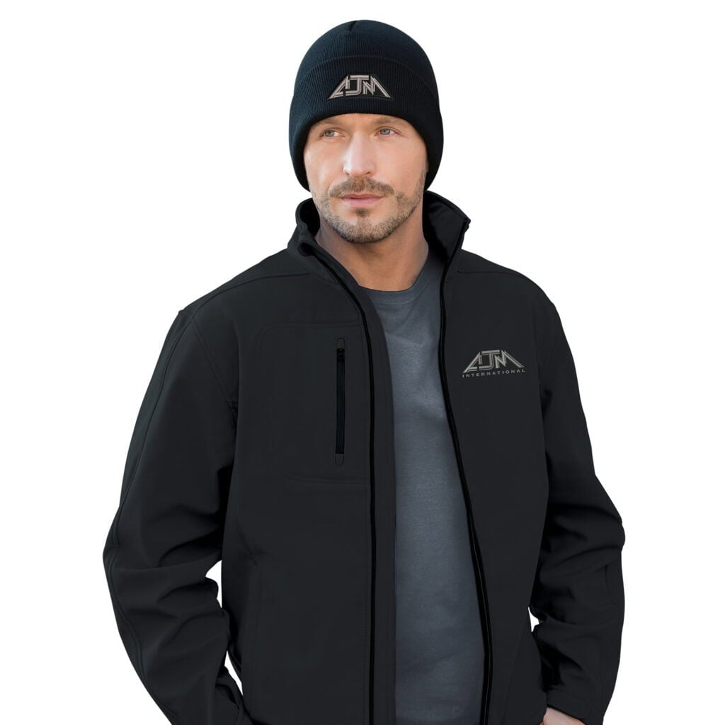 Man wearing black outdoor jacket and beanie with CanPromos logo.